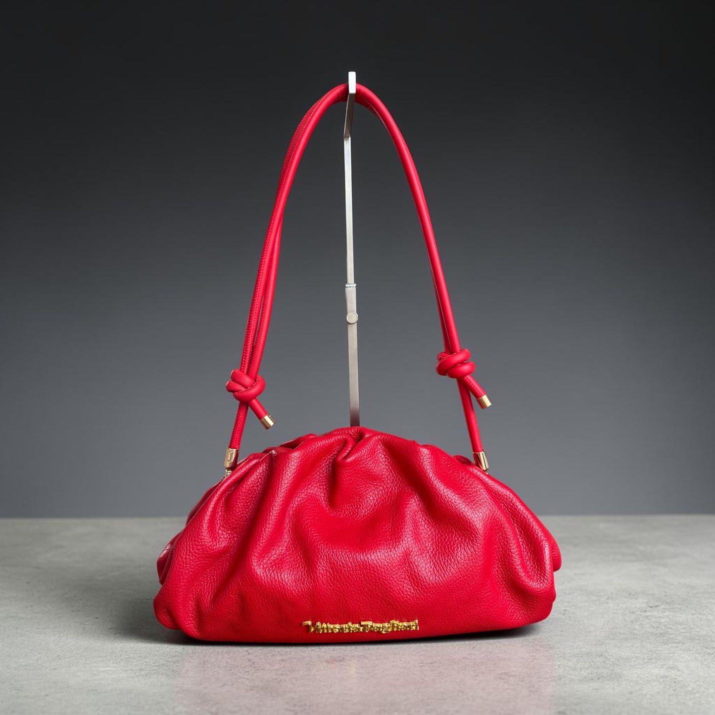 Borsa pouch in pelle martellata,